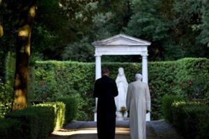 Pope Benedict XVI in walking around the gardens at Castel Gandolfo. Pope Benedict XVI in walking around the gardens at Castel Gandolfo.