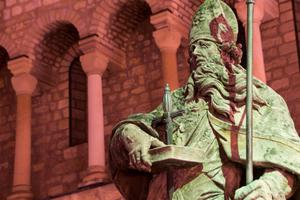 A statue of St. Boniface at St. Martin’s Cathedral in Mainz, Germany, is a tribute to the saint who brought Christianity to Germany. A statue of St. Boniface at St. Martin’s Cathedral in Mainz, Germany, is a tribute to the saint who brought Christianity to Germany.