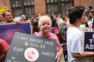 Pro-life activists in front of Planned Parenthood's Margaret Sanger Clinic on Bleecker St in Manhattan. Pro-life activists in front of Planned Parenthood's Margaret Sanger Clinic on Bleecker St in Manhattan.
