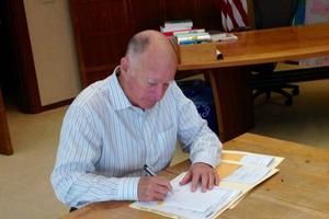 California Gov. Jerry Brown signs a bill in March 2015. California Gov. Jerry Brown signs a bill in March 2015.