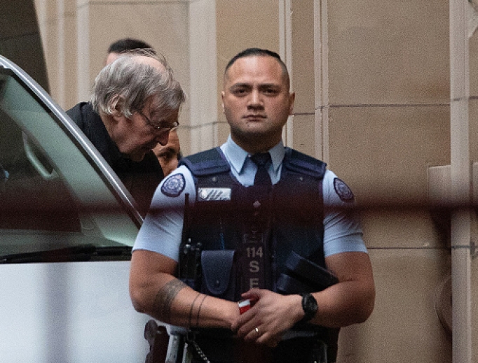 Australian Cardinal George Pell (c) is escorted into the Supreme Court of Victoria in Melbourne on Aug. 21, the day his appeal against sex-abuse charges was rejected. Australian Cardinal George Pell (c) is escorted into the Supreme Court of Victoria in Melbourne on Aug. 21, the day his appeal against sex-abuse charges was rejected.