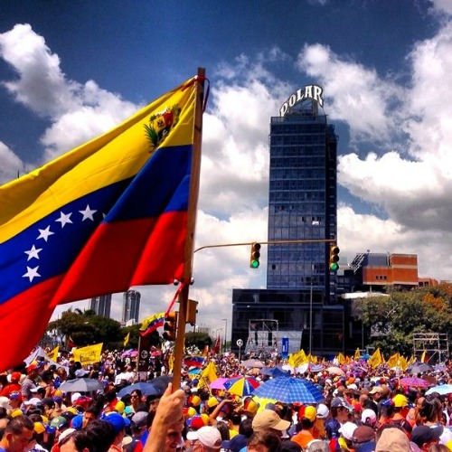 Protesters demonstrate peacefully against the government in Caracas, Venezuela, on Feb. 12. Protesters demonstrate peacefully against the government in Caracas, Venezuela, on Feb. 12.