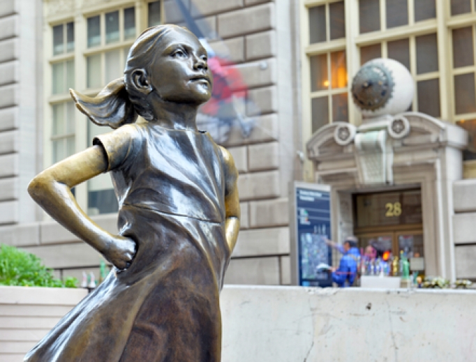 Statue of a fearless girl opposite the Charging Bull in lower Manhattan, 2018. Statue of a fearless girl opposite the Charging Bull in lower Manhattan, 2018.