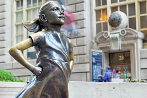 Statue of a fearless girl opposite the Charging Bull in lower Manhattan, 2018. Statue of a fearless girl opposite the Charging Bull in lower Manhattan, 2018.