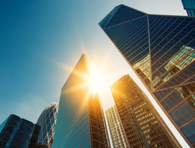 Sun hitting buildings in the business center of Paris. Sun hitting buildings in the business center of Paris.