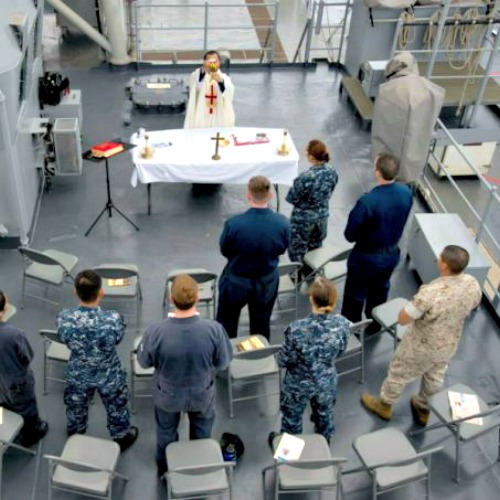 US Navy Chaplain Lt. Tung Tran says Mass aboard the USS Rushmore, June 21, 2014. US Navy Chaplain Lt. Tung Tran says Mass aboard the USS Rushmore, June 21, 2014.