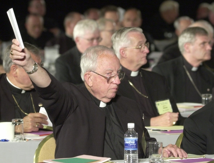 Bishop Walter Sullivan of Richmand, Virginia, holds up a ballot during the voting on the Charter for the Protection of Children and Young People at the U.S. Conference of Catholic Bishops' meeting in Dallas June 14. 2002. The charter celebrates its 15th anniversary this week and has made the U.S. Catholic Church one of the safest places for children anywhere in the world. Bishop Walter Sullivan of Richmand, Virginia, holds up a ballot during the voting on the Charter for the Protection of Children and Young People at the U.S. Conference of Catholic Bishops' meeting in Dallas June 14. 2002. The charter celebrates its 15th anniversary this week and has made the U.S. Catholic Church one of the safest places for children anywhere in the world.