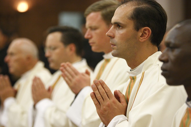 Priests pray during Mass celebrated by top Vatican officials at the Legionaries of Christ's Center for Higher Studies in Rome June 8. The Mass, concelebrated by Cardinal Claudio Hummes, prefect of the Congregation for Clergy, and Cardinal Antonio Canizar es Llovera, prefect of the Vatican's Congregation for Divine Worship and the Sacraments, was one of several events for priests gathered in Rome to conclude the Year for Priests. Priests pray during Mass celebrated by top Vatican officials at the Legionaries of Christ's Center for Higher Studies in Rome June 8. The Mass, concelebrated by Cardinal Claudio Hummes, prefect of the Congregation for Clergy, and Cardinal Antonio Canizar es Llovera, prefect of the Vatican's Congregation for Divine Worship and the Sacraments, was one of several events for priests gathered in Rome to conclude the Year for Priests.