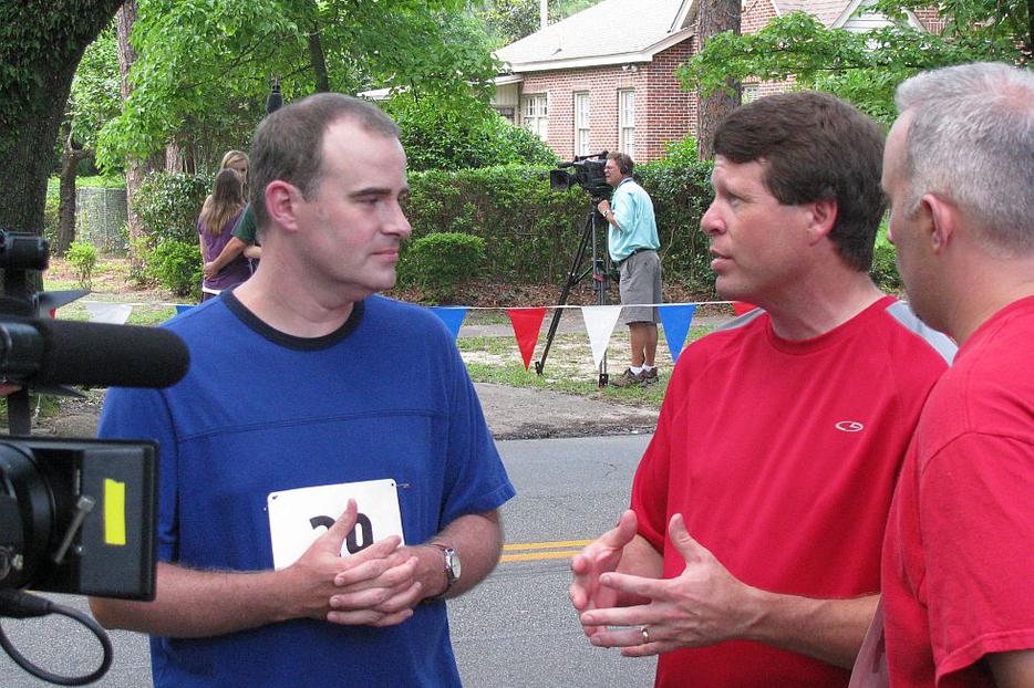 Jim Bob Duggar (middle) talks with "Courageous" filmmakers, actor and director Alex Kendrick (left) and his brother, writer and producer Stephen Kendrick. (Photo by Tim Drake) Jim Bob Duggar (middle) talks with "Courageous" filmmakers, actor and director Alex Kendrick (left) and his brother, writer and producer Stephen Kendrick. (Photo by Tim Drake)