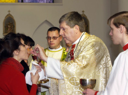 Father Daniel Maurer distributes Communion at the mission of Most Holy Mother of God Church in Vladivostok, Russia. Father Daniel Maurer distributes Communion at the mission of Most Holy Mother of God Church in Vladivostok, Russia.