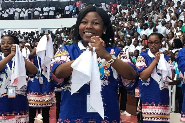 Youth perform a dance in the Maxaquene Pavilion in Maputo before the arrival of Pope Francis Sept. 5. Youth perform a dance in the Maxaquene Pavilion in Maputo before the arrival of Pope Francis Sept. 5.