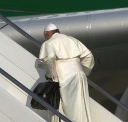 Pope Francis boards the papal plane July 22 at Rome's Fiumicino Airport.
Pope Francis boards the papal plane July 22 at Rome's Fiumicino Airport.