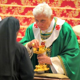 Pope Benedict XVI gives Communion to a woman religious Oct. 28 at the closing Mass of the Synod of Bishops for the New Evangelization. Pope Benedict XVI gives Communion to a woman religious Oct. 28 at the closing Mass of the Synod of Bishops for the New Evangelization.