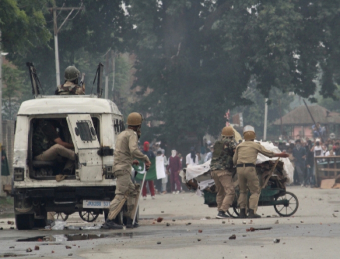 Indian government forces covering the points of the stone pelters during the clashes erupted between the Kashmiri Muslim protesters and mobs, 2018. Indian government forces covering the points of the stone pelters during the clashes erupted between the Kashmiri Muslim protesters and mobs, 2018.