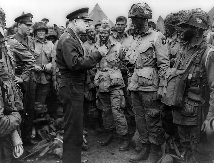 General Dwight D. Eisenhower addresses American paratroopers prior to D-Day. General Dwight D. Eisenhower addresses American paratroopers prior to D-Day.