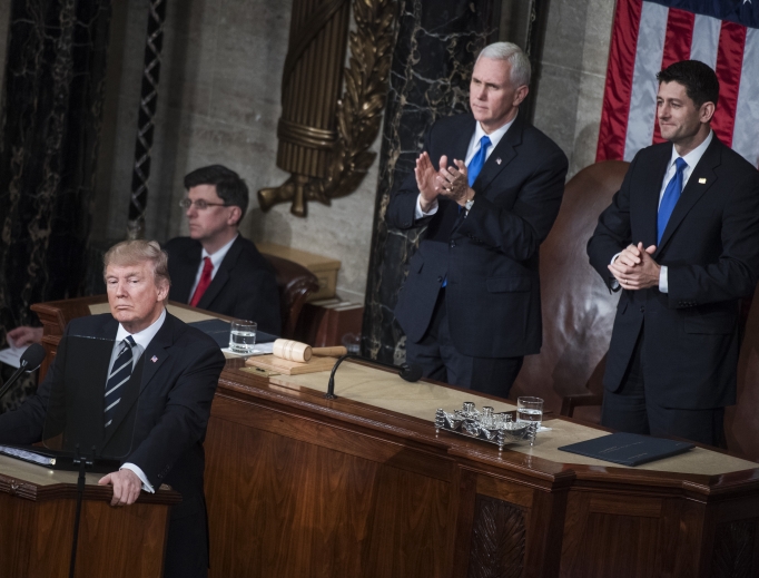 President Donald Trump addresses a joint session of Congress in the Capitol House Chamber, as Speaker Paul Ryan, R-Wis., right, and Vice President Mike Pence look on, Feb. 28. President Donald Trump addresses a joint session of Congress in the Capitol House Chamber, as Speaker Paul Ryan, R-Wis., right, and Vice President Mike Pence look on, Feb. 28.