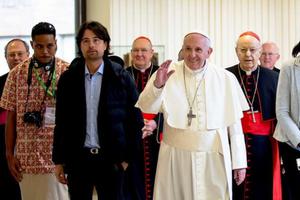 Pope Francis stands with delegates at the Vatican's pre-synodal youth meeting in March. Pope Francis stands with delegates at the Vatican's pre-synodal youth meeting in March.