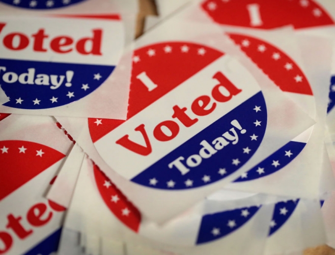 Stickers are made available to voters who cast a ballot in the midterm elections at the Polk County Election Office Oct. 8 in Des Moines, Iowa. Oct. 8 was the first day of early voting in the state. Stickers are made available to voters who cast a ballot in the midterm elections at the Polk County Election Office Oct. 8 in Des Moines, Iowa. Oct. 8 was the first day of early voting in the state.