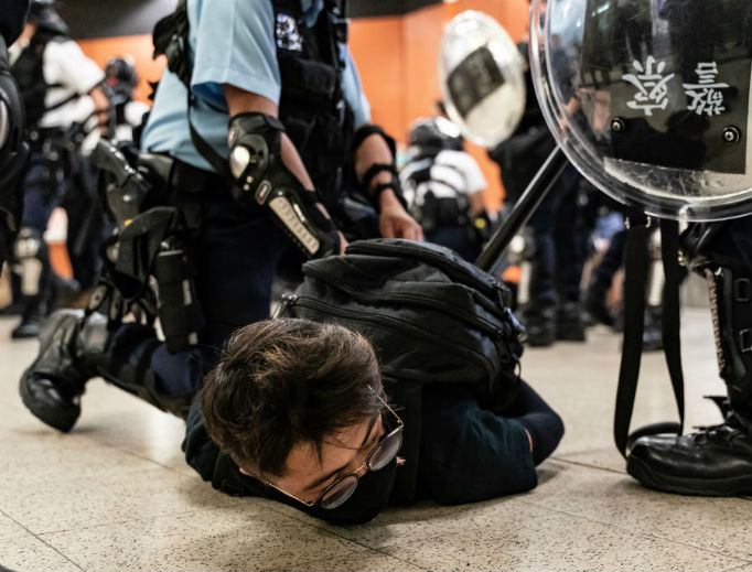 A Hong Kong protester is detained by police at Po Lam Station on Sept. 5, 2019 in Hong Kong, China. Pro-democracy protesters have continued demonstrations across Hong Kong since 9 June against a controversial bill that allows extraditions to mainland China, as the ongoing protests, many ending up in violent clashes with the police.
A Hong Kong protester is detained by police at Po Lam Station on Sept. 5, 2019 in Hong Kong, China. Pro-democracy protesters have continued demonstrations across Hong Kong since 9 June against a controversial bill that allows extraditions to mainland China, as the ongoing protests, many ending up in violent clashes with the police.