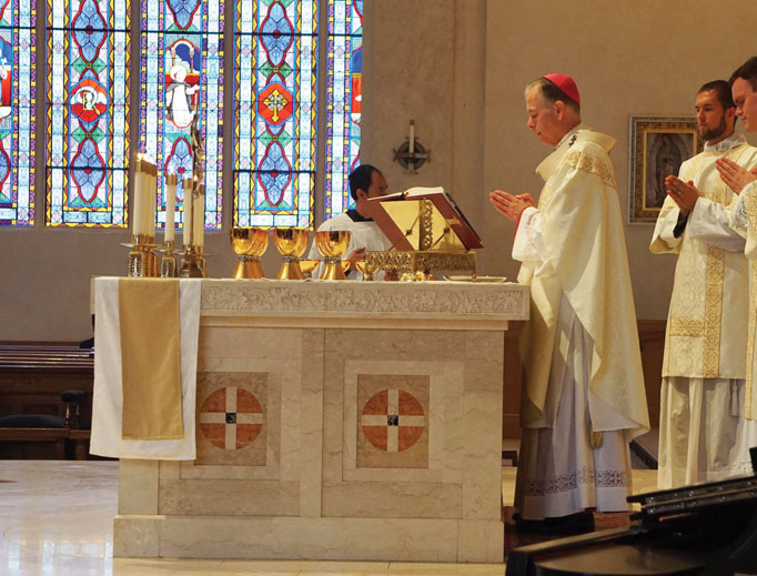Archbishop Alexander Sample, shown celebrating Mass, says the aim of the ‘Archdiocesan Liturgical Handbook’ (shown below) is to emphasize the need to ‘celebrate the liturgy according to the mind and heart of the Church.’ Archbishop Sample adds, ‘We are called to celebrate the sacred liturgy not according to our own preferences, but to the way the Church asks us to celebrate the liturgy in continuity with the long Tradition of the Church.’ Archbishop Alexander Sample, shown celebrating Mass, says the aim of the ‘Archdiocesan Liturgical Handbook’ (shown below) is to emphasize the need to ‘celebrate the liturgy according to the mind and heart of the Church.’ Archbishop Sample adds, ‘We are called to celebrate the sacred liturgy not according to our own preferences, but to the way the Church asks us to celebrate the liturgy in continuity with the long Tradition of the Church.’