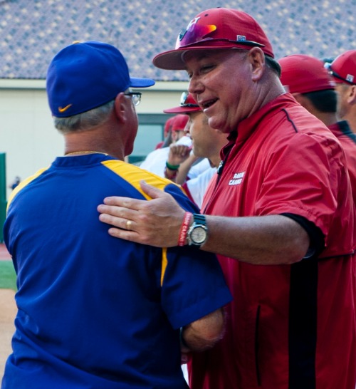Louisiana State-Lafayette coach Tony Robichaux (r) greets LSU coach Paul Mainieri Louisiana State-Lafayette coach Tony Robichaux (r) greets LSU coach Paul Mainieri