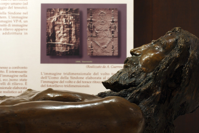 A bronze statue, titled 'The Body of the Man of the Shroud,' is seen in an exhibit on the Shroud of Turin at Regina Apostolorum University in Rome. The actual artifact is on display through May 23 in Turin. A bronze statue, titled 'The Body of the Man of the Shroud,' is seen in an exhibit on the Shroud of Turin at Regina Apostolorum University in Rome. The actual artifact is on display through May 23 in Turin.