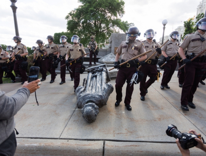 Members of AIM Twin Cities and other Native community residents topple the statue of Christopher Columbus located on the Minnesota State Capitol grounds in St. Paul. Members of AIM Twin Cities and other Native community residents topple the statue of Christopher Columbus located on the Minnesota State Capitol grounds in St. Paul.