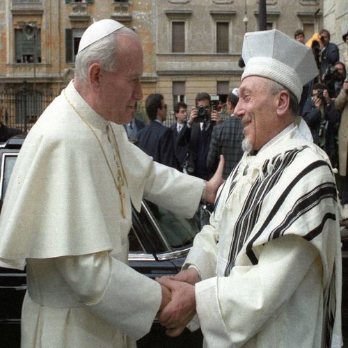 Pope St. John Paul II greeting the former chief Rabbi of Rome Elio Toaff during the first recorded papal visit to a synagogue at Rome's central synagogue on April 13, 1986.
Pope St. John Paul II greeting the former chief Rabbi of Rome Elio Toaff during the first recorded papal visit to a synagogue at Rome's central synagogue on April 13, 1986.