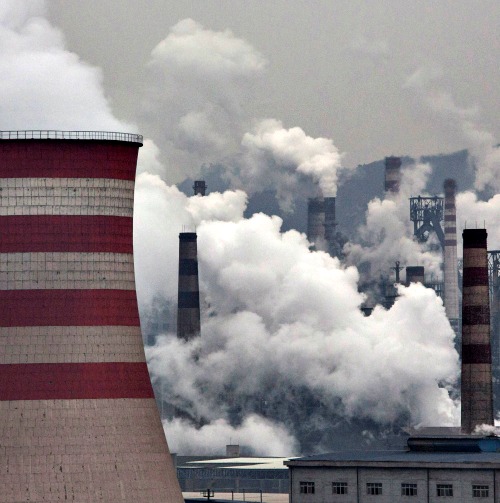 Smoke billows from smokestacks and a coal-fired generator at a steel factory on Nov. 19 in the industrial province of Hebei, China. At an upcoming conference in Paris, the governments of 196 countries will meet to set targets on reducing carbon emissions in an attempt to forge a new global agreement on climate change.
Smoke billows from smokestacks and a coal-fired generator at a steel factory on Nov. 19 in the industrial province of Hebei, China. At an upcoming conference in Paris, the governments of 196 countries will meet to set targets on reducing carbon emissions in an attempt to forge a new global agreement on climate change.