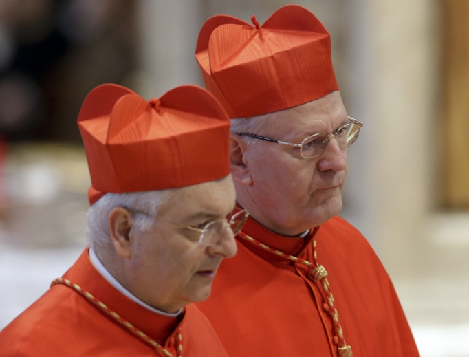 Cardinal Peter Erdo, of Hungary, right, and Cardinal Mauro Piacenza attend a Mass during the papal conclave at St. Peter's Basilica March 12, 2013. Cardinal Piacenza has written a new book about confession. Cardinal Peter Erdo, of Hungary, right, and Cardinal Mauro Piacenza attend a Mass during the papal conclave at St. Peter's Basilica March 12, 2013. Cardinal Piacenza has written a new book about confession.