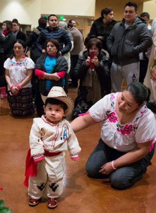 Latino Catholics participate in a celebration Dec. 12, 2013, at Our Lady of Guadalupe Mission in the Archdiocese of Anchorage, Alaska. Latino Catholics participate in a celebration Dec. 12, 2013, at Our Lady of Guadalupe Mission in the Archdiocese of Anchorage, Alaska.