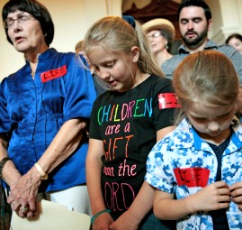 Pro-life supporters pray in the Texas State Capitol July 1 prior to the vote to prohibit abortions in Texas after 20 weeks of a woman's pregnancy. Pro-life supporters pray in the Texas State Capitol July 1 prior to the vote to prohibit abortions in Texas after 20 weeks of a woman's pregnancy.