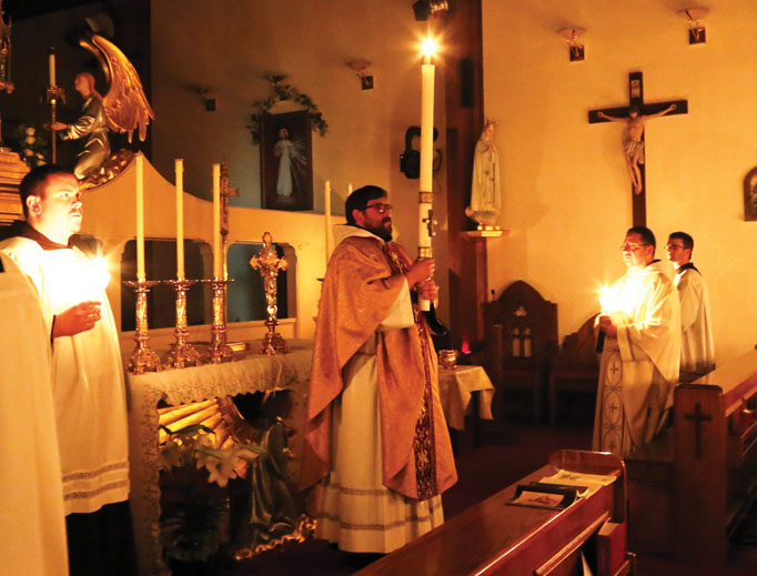 The Franciscan Missionaries of the Eternal Word celebrate the Easter vigil each year — Father Leonard Mary is shown above in 2016 and images of the 2018 vigil are below — with the reverence and hope the liturgy fosters for the faithful. The Franciscan Missionaries of the Eternal Word celebrate the Easter vigil each year — Father Leonard Mary is shown above in 2016 and images of the 2018 vigil are below — with the reverence and hope the liturgy fosters for the faithful.