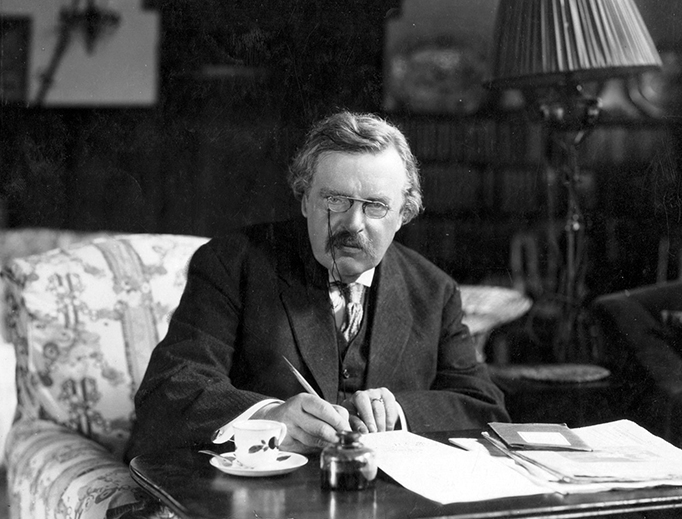 G.K. Chesterton at work in his study
G.K. Chesterton at work in his study