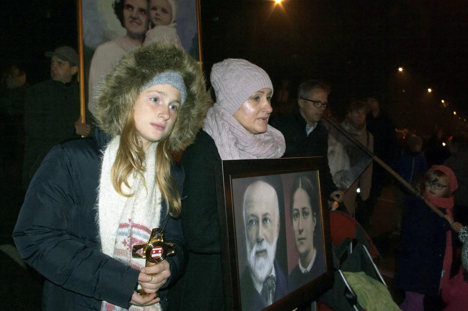 ABOVE: Poles participate in the All Saints’ Ball Oct. 31, 2019 (Paweł Siciński/EWTN Polska). BELOW: Beskiel Cemetery, Oswiecim, Poland, Nov. 1, 1984 ABOVE: Poles participate in the All Saints’ Ball Oct. 31, 2019 (Paweł Siciński/EWTN Polska). BELOW: Beskiel Cemetery, Oswiecim, Poland, Nov. 1, 1984