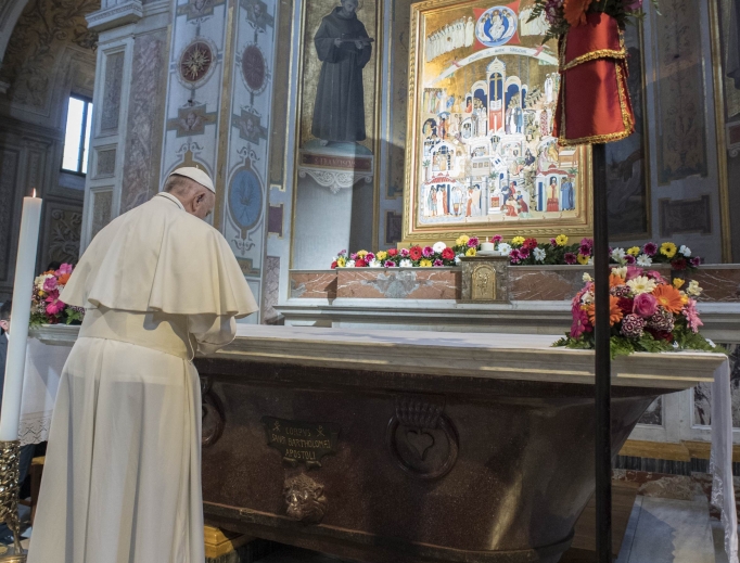 Pope Francis prays at the Church of San Bartolomeo in Rome on April 22. Pope Francis prays at the Church of San Bartolomeo in Rome on April 22.