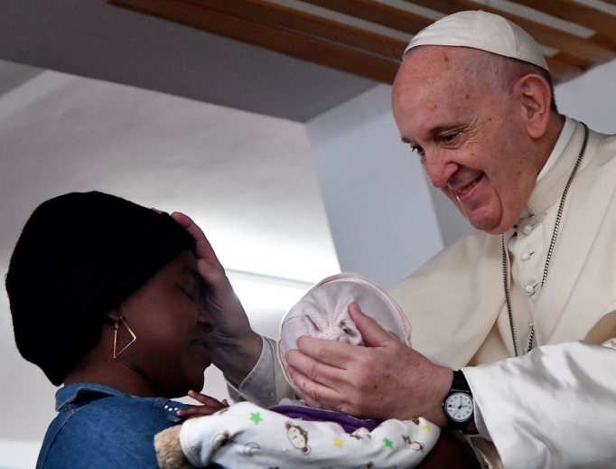 Pope Francis blesses a mother with a baby during his visit to Zimpeto hospital in Maputo, Mozambique, Sept. 6.
Pope Francis blesses a mother with a baby during his visit to Zimpeto hospital in Maputo, Mozambique, Sept. 6.