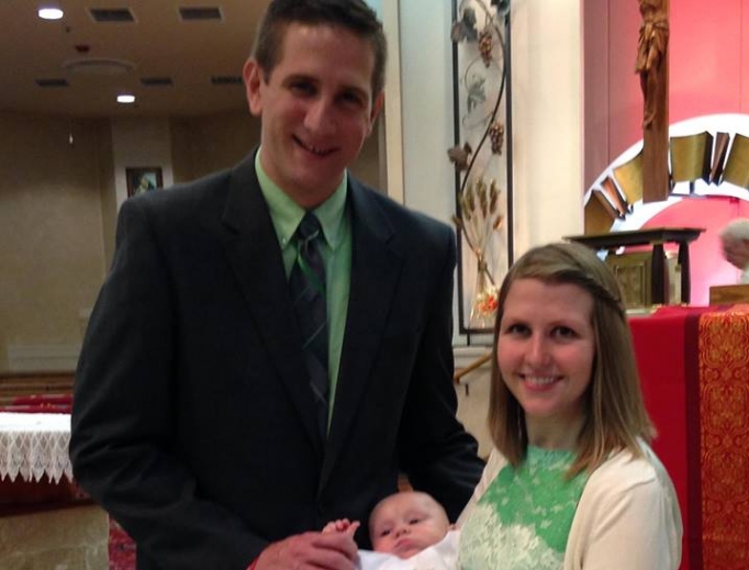 Kyle and Jessica Goldcamp, with their son, Luke, at his baptism. Kyle and Jessica Goldcamp, with their son, Luke, at his baptism.