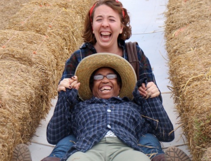 Sarah Ruszkowski and Eileen Schofield delight in going down a slide together at Cox Farm. Sarah Ruszkowski and Eileen Schofield delight in going down a slide together at Cox Farm.