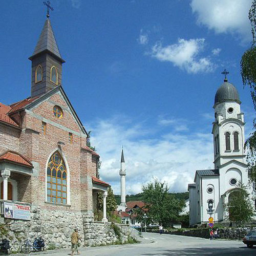 A Catholic church, a mosque and a Serbian Orthodox church in Bosanska Krupa, Bosnia and Herzegovina. A Catholic church, a mosque and a Serbian Orthodox church in Bosanska Krupa, Bosnia and Herzegovina.