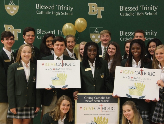 Above, Students from Blessed Trinity High School in Roswell, Georgia, in the Archdiocese of Atlanta are blessed by the generosity of iGiveCatholic. Below, the Archdiocese for the Military Services participates in the giving campaign to raise funds for military priests; and Father Mitch Semar, pastor of St. Thomas Aquinas Catholic Church and Student Center at Nicholls State College, shown with the Colonel mascot, and students at Nicholls State University in Thibodaux, Louisiana, in the Diocese of Houma-Thibodaux, were able to fundraise for their new Two Hearts Perpetual Adoration Chapel.
Above, Students from Blessed Trinity High School in Roswell, Georgia, in the Archdiocese of Atlanta are blessed by the generosity of iGiveCatholic. Below, the Archdiocese for the Military Services participates in the giving campaign to raise funds for military priests; and Father Mitch Semar, pastor of St. Thomas Aquinas Catholic Church and Student Center at Nicholls State College, shown with the Colonel mascot, and students at Nicholls State University in Thibodaux, Louisiana, in the Diocese of Houma-Thibodaux, were able to fundraise for their new Two Hearts Perpetual Adoration Chapel.