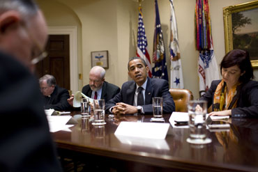 President Barack Obama holds a roundtable briefing July 2 in the Roosevelt Room with Catholic press, including Register publisher Father Owen Kearns (left foreground). President Barack Obama holds a roundtable briefing July 2 in the Roosevelt Room with Catholic press, including Register publisher Father Owen Kearns (left foreground).
