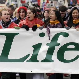 YOUNG PEOPLE FOR LIFE. March for Life participants make their way up Constitution Avenue to the Supreme Court building in Washington Jan. 22. YOUNG PEOPLE FOR LIFE. March for Life participants make their way up Constitution Avenue to the Supreme Court building in Washington Jan. 22.