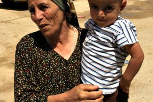 An woman and child at a refugee camp in Erbil, Iraq. The woman claims her husband was kidnapped by the Islamic State group. Below, Father Benedict Kiely of the Diocese of Burlington, Vt., with a group of Dominican nuns who minister to Iraqi refugees, and Christian refugees make do at one of the camps. An woman and child at a refugee camp in Erbil, Iraq. The woman claims her husband was kidnapped by the Islamic State group. Below, Father Benedict Kiely of the Diocese of Burlington, Vt., with a group of Dominican nuns who minister to Iraqi refugees, and Christian refugees make do at one of the camps.