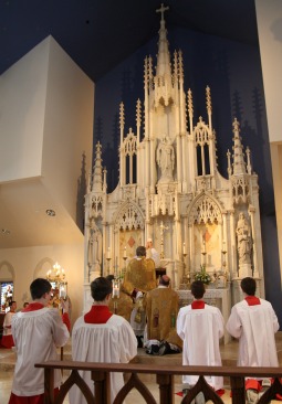 Mass being celebrated at the central altar of Our Lady of Mount Carmel Church in Littleton, Colo. Mass being celebrated at the central altar of Our Lady of Mount Carmel Church in Littleton, Colo.