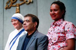 Sister Mary Prema Pierick, superior general of the Missionaries of Charity, Marcilio Haddad Andrino, a Brazilian miraculously healed of multiple brain abscesses due to Mother Teresa's intercession, and his wife Fernanda, at the Vatican, Sept. 2, 2016. Sister Mary Prema Pierick, superior general of the Missionaries of Charity, Marcilio Haddad Andrino, a Brazilian miraculously healed of multiple brain abscesses due to Mother Teresa's intercession, and his wife Fernanda, at the Vatican, Sept. 2, 2016.
