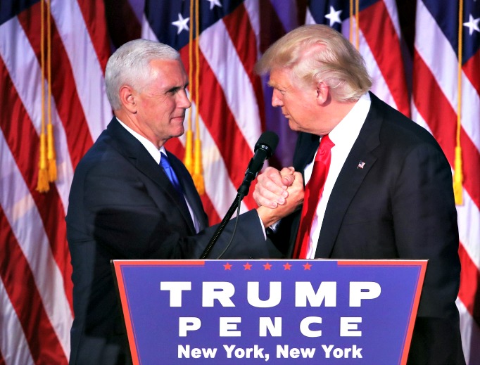 President-elect Donald Trump and his running mate Mike Pence shake hands after his victory speech Nov. 9 at the New York Hilton Midtown. Donald Trump defeated Democratic presidential nominee Hillary Clinton to become the 45th president of the United States. President-elect Donald Trump and his running mate Mike Pence shake hands after his victory speech Nov. 9 at the New York Hilton Midtown. Donald Trump defeated Democratic presidential nominee Hillary Clinton to become the 45th president of the United States.