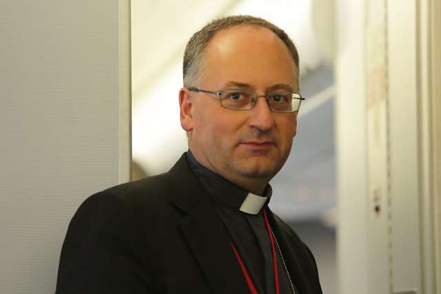 Jesuit Father Antonio Spadaro, editor in chief of La Civiltà Cattolica, aboard the papal flight to Quito, July 5, 2015. Jesuit Father Antonio Spadaro, editor in chief of La Civiltà Cattolica, aboard the papal flight to Quito, July 5, 2015.