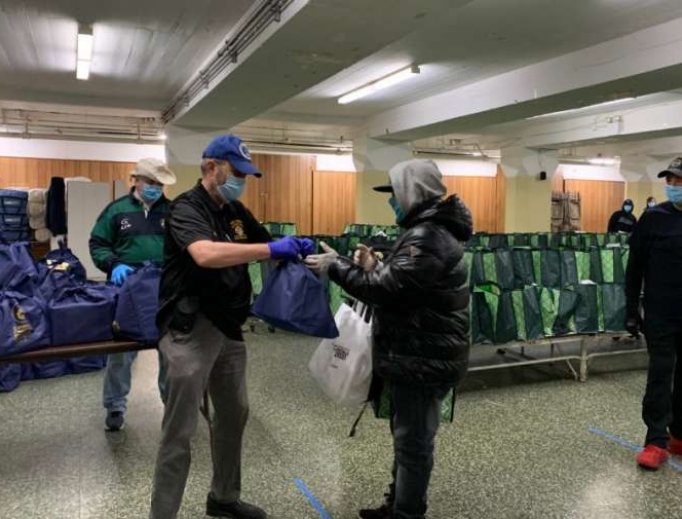 Catholic Charities distribute food at St. Michael – St. Malachy Parish, Brooklyn. April 24, 2020. Catholic Charities distribute food at St. Michael – St. Malachy Parish, Brooklyn. April 24, 2020.