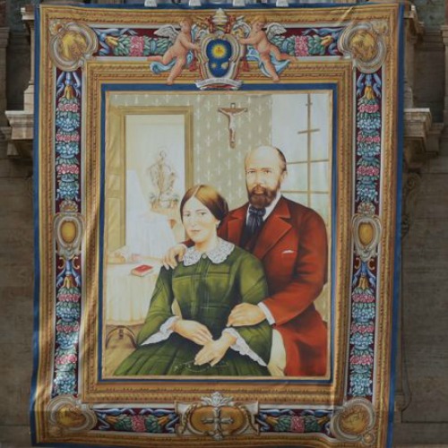 A tapestry of Blessed Louis and Zelie Martin, parents of St. Therese of Lisieux, hanging in St. Peter's Square Oct. 16 in preparation for their canonization on Sunday. A tapestry of Blessed Louis and Zelie Martin, parents of St. Therese of Lisieux, hanging in St. Peter's Square Oct. 16 in preparation for their canonization on Sunday.